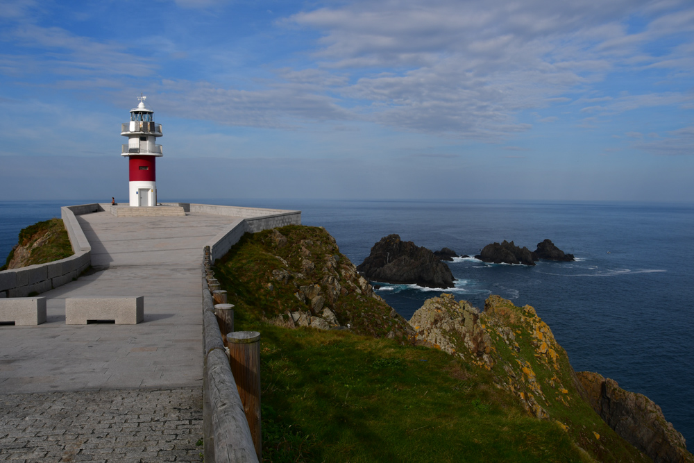 Leuchtturm Felsen im Meer Galicien