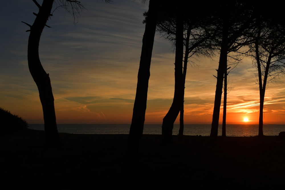 Sonnenuntergang durch Baueme Meer Portugal