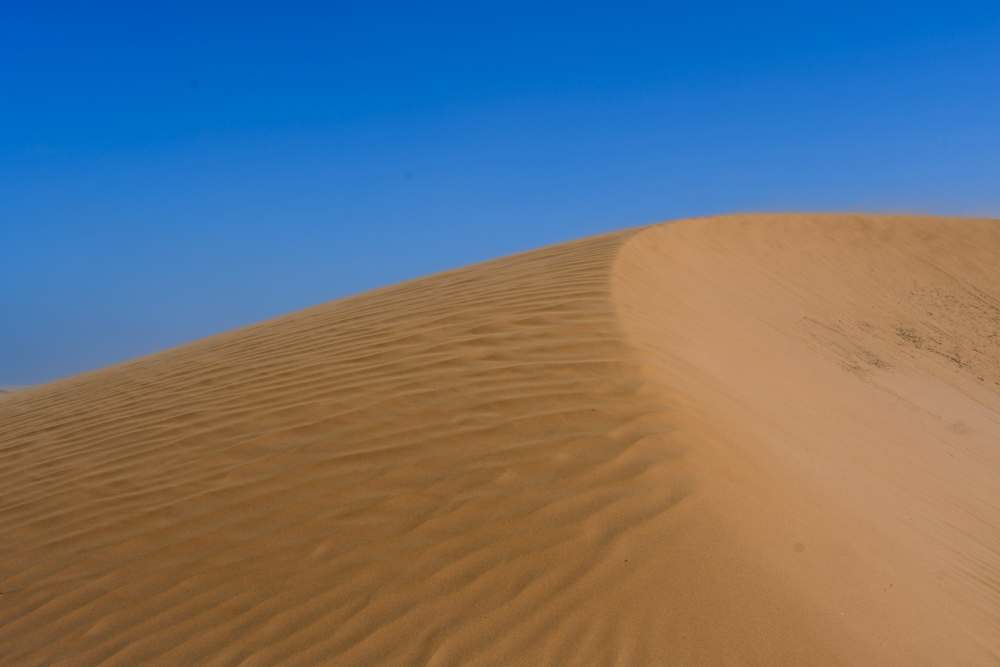 Sandduene blauer Himmel